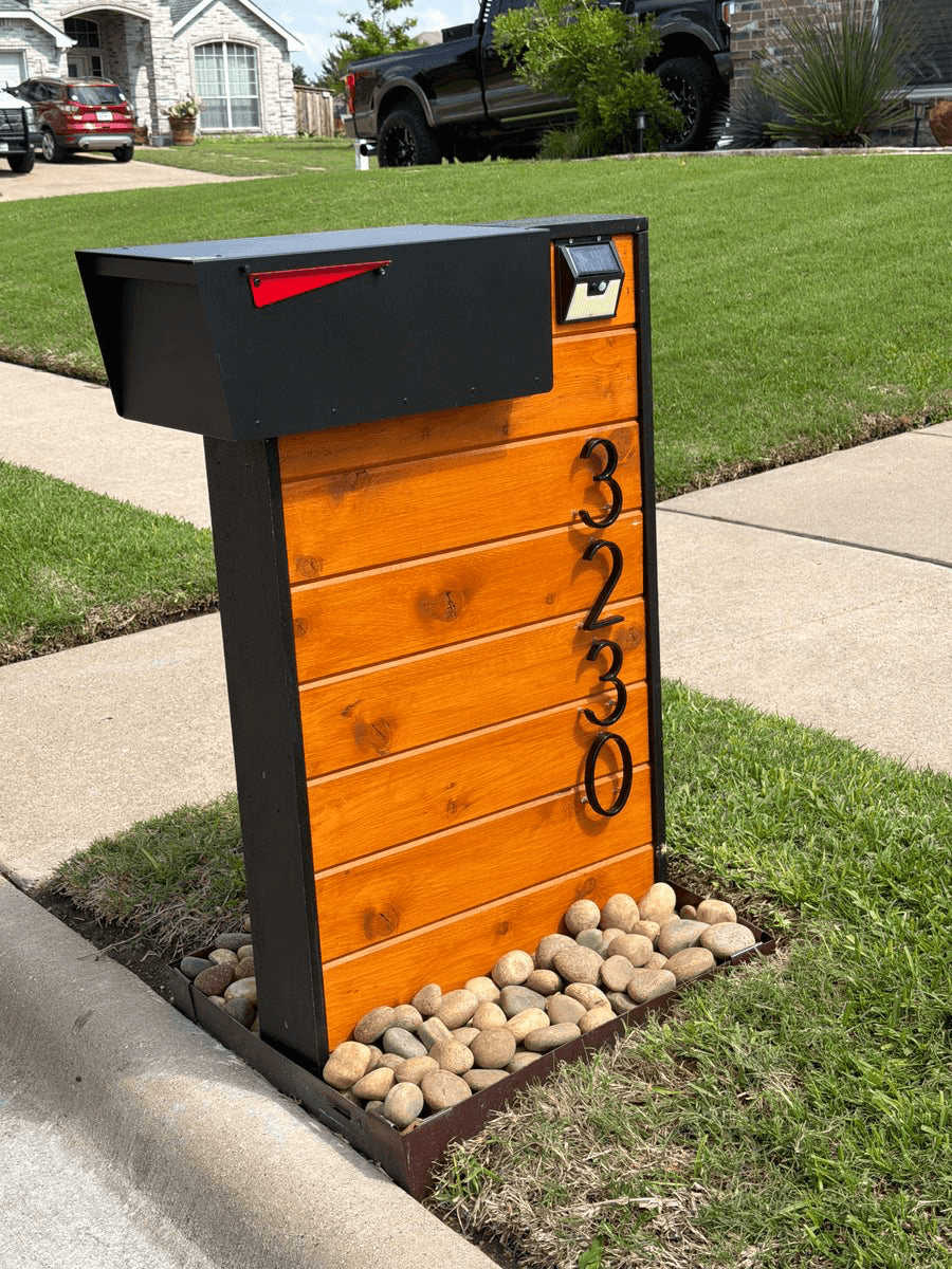 New mailbox post set in fresh concrete for a Louisville installation